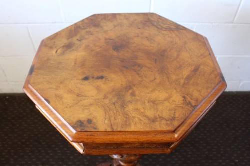**RS17** An antique (c1890's) Victorian walnut octagonal sewing table w/ an array of compartments