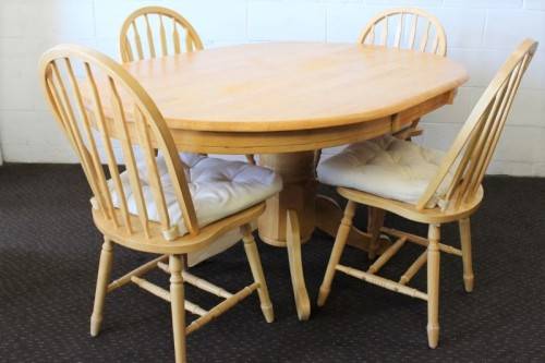 A stunning solid beech wood oval dining table with four gorgeous matching beech wood dining chairs
