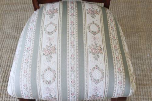 **RS17** A hand-carved antique Victorian slipper/ nursing chair upholstered in a beautiful fabric