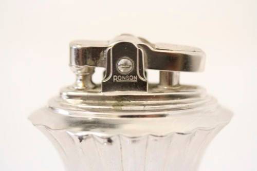 A spectacular vintage (1947) silver plate "Ronson New Port Table Lighter" made in England.