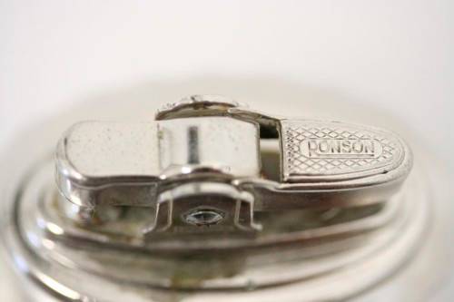 A spectacular vintage (1947) silver plate "Ronson New Port Table Lighter" made in England.