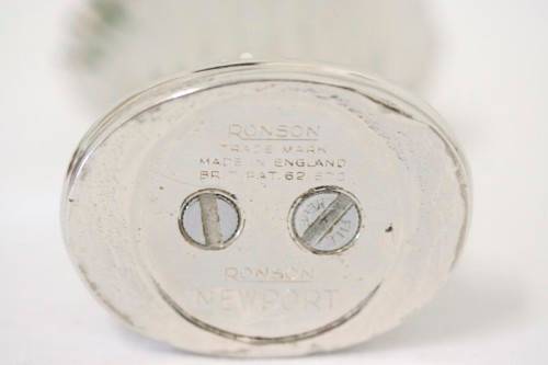 A spectacular vintage (1947) silver plate "Ronson New Port Table Lighter" made in England.
