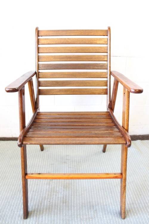 A fabulous 6-seater solid Sapele wood, all weather "Outback" outdoor patio table with 6 armchairs