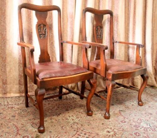 Two beautiful carved back vintage solid Oak armchairs/ carvers w leather seats - stunning!