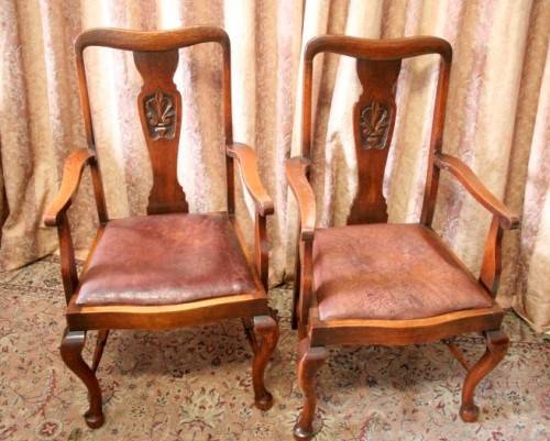 Two beautiful carved back vintage solid Oak armchairs/ carvers w leather seats - stunning!