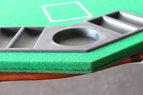 **RS17** A felt-lined folding poker table with built in chip racks and drink holders, in a carry bag