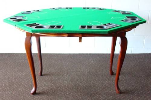 **RS17** A felt-lined folding poker table with built in chip racks and drink holders, in a carry bag