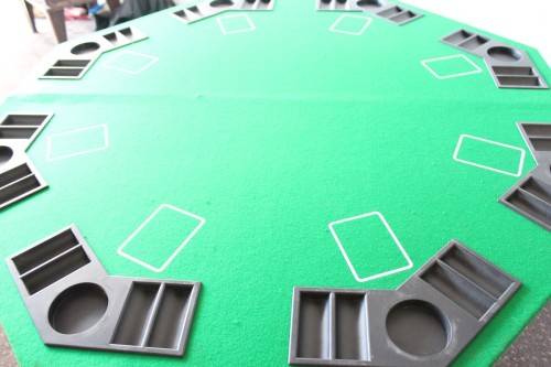**RS17** A felt-lined folding poker table with built in chip racks and drink holders, in a carry bag