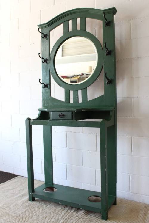A lovely green painted hall stand w/a centre mirror, storage drawer & space for umbrellas/ canes etc