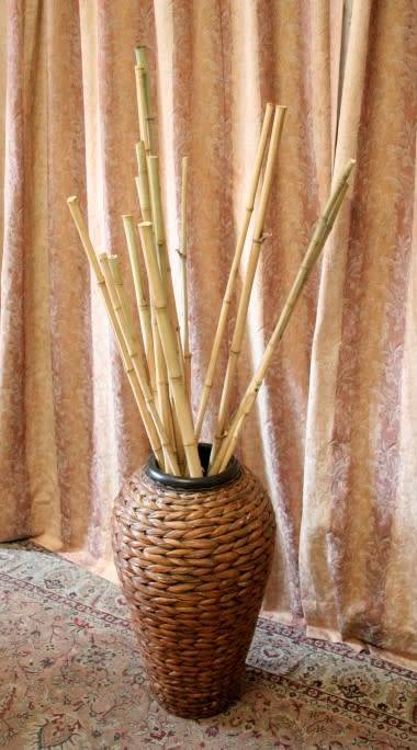 A**RS17** A large floor standing woven pot. Gorgeous on its own or w/ large sticks or reeds.