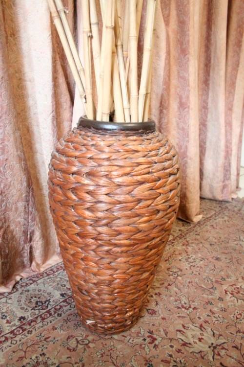 A**RS17** A large floor standing woven pot. Gorgeous on its own or w/ large sticks or reeds.