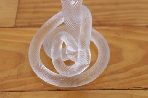 A stunning & very unusual hand blown glass single-candle candle stick w/ an incredible twirled base