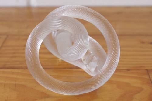 A stunning & very unusual hand blown glass single-candle candle stick w/ an incredible twirled base