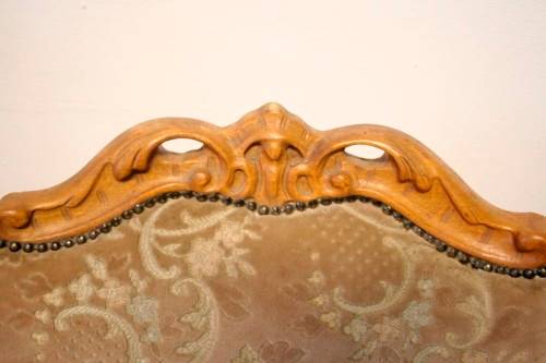 **RS17** A gorgeous Victorian "parlour chair" with carved detailing and floral upholstery.