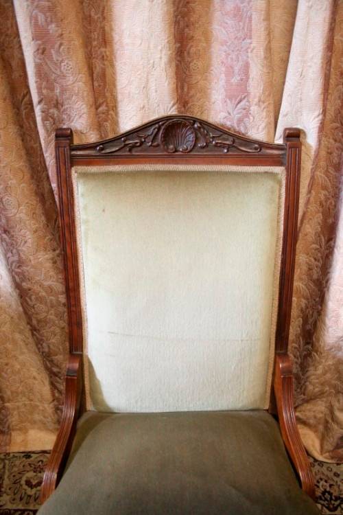 **RS17** A hand-carved antique Victorian slipper/ nursing chair upholstered in a soft green fabric