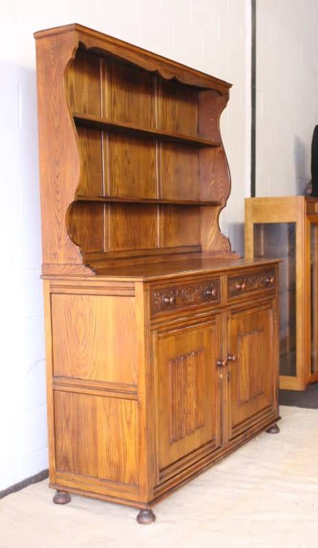A stunning tall solid oak Welsh Dresser with a double-door cupboard & two good size cutlery drawers