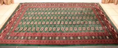 **RS17** A superb (189cm x 289cm long) rare green and red Kashmir Mori Bukhara Persian carpet
