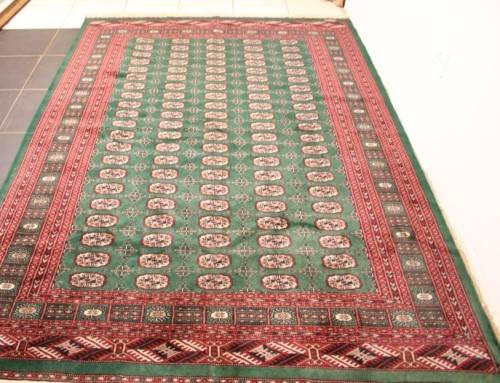 **RS17** A superb (189cm x 289cm long) rare green and red Kashmir Mori Bukhara Persian carpet