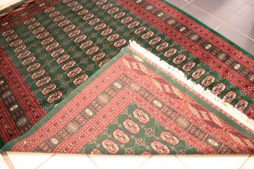**RS17** A superb (189cm x 289cm long) rare green and red Kashmir Mori Bukhara Persian carpet