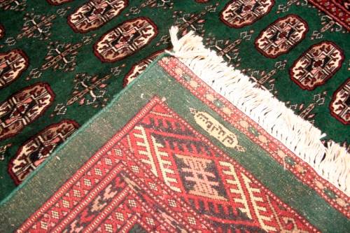 **RS17** A superb (189cm x 289cm long) rare green and red Kashmir Mori Bukhara Persian carpet