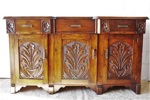 A gorgeous Victorian heavily carved solid Oak three-door side server with loads of drawer space!