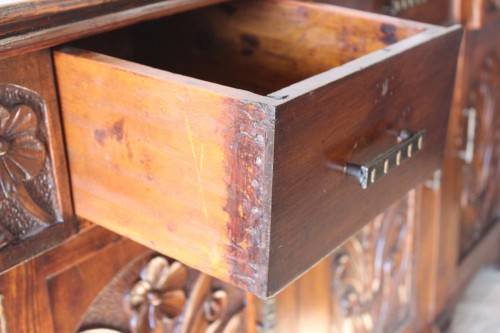 A gorgeous Victorian heavily carved solid Oak three-door side server with loads of drawer space!