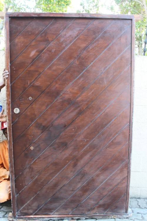 A stunning large 119cm x 202.5cm solid Sapele Wood diagonal pivot slatted front door-Lifespace Sale
