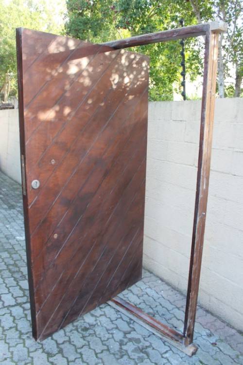 A stunning large 119cm x 202.5cm solid Sapele Wood diagonal pivot slatted front door-Lifespace Sale