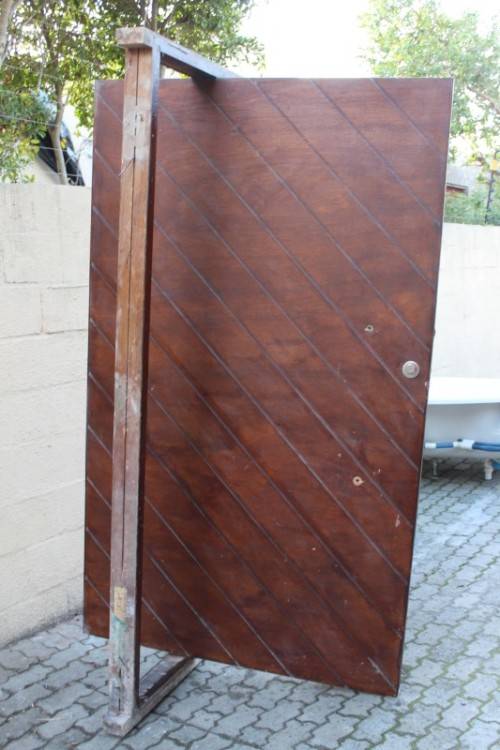 A stunning large 119cm x 202.5cm solid Sapele Wood diagonal pivot slatted front door-Lifespace Sale