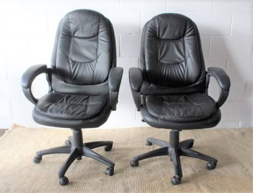 Stunning well made black PU leather executives office chair w/ padded seat & backrest - price/ chair