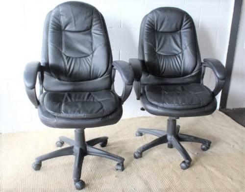 Stunning well made black PU leather executives office chair w/ padded seat & backrest - price/ chair