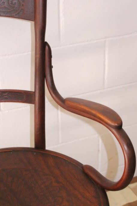 An incredible rare antique Edwardian solid oak bentwood armchair/ carver chair with pressed pattern
