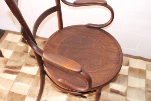 An incredible rare antique Edwardian solid oak bentwood armchair/ carver chair with pressed pattern