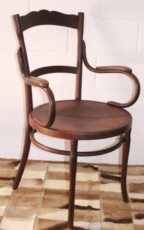 An incredible rare antique Edwardian solid oak bentwood armchair/ carver chair with pressed pattern