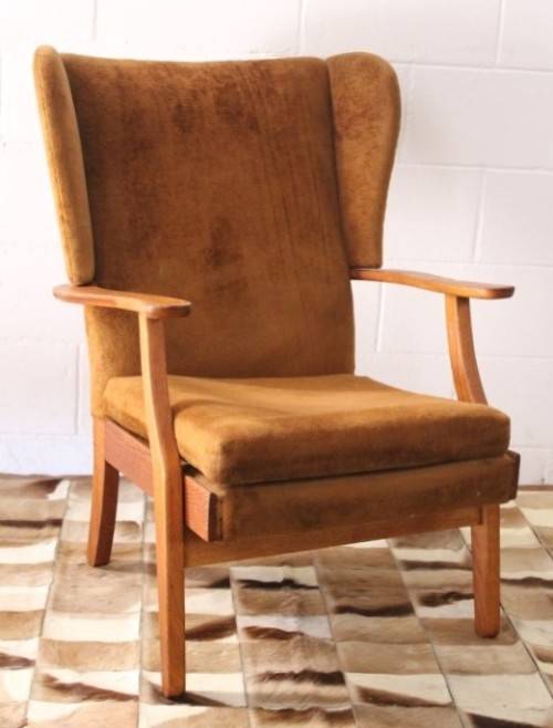 **RS17** Wonderful vintage mid-century solid oak retro-brown period-upholstered wing back armchair