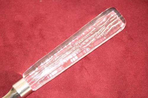 A stunning and rare vintage Swedish made Lindshammar Glass cheese knife with a steel blade