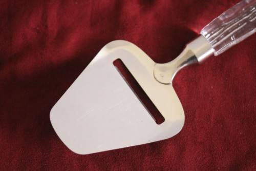 A stunning and rare vintage Swedish made Lindshammar Glass cheese knife with a steel blade