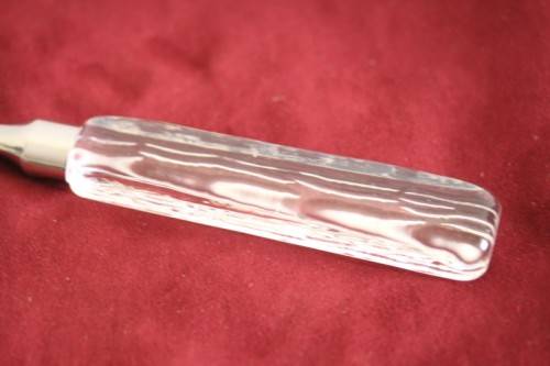 A stunning and rare vintage Swedish made Lindshammar Glass cheese knife with a steel blade