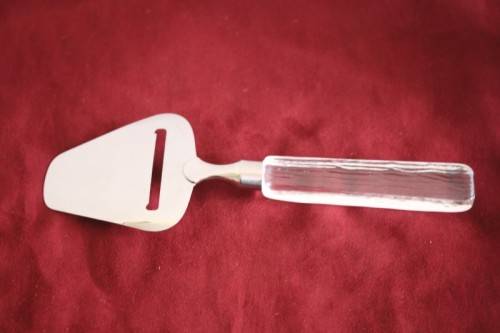 A stunning and rare vintage Swedish made Lindshammar Glass cheese knife with a steel blade