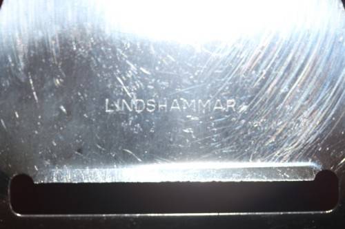 A stunning and rare vintage Swedish made Lindshammar Glass cheese knife with a steel blade