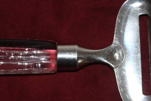 A stunning and rare vintage Swedish made Lindshammar Glass cheese knife with a steel blade