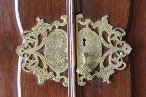An impressive antique solid honeyed oak gabled double-door wardrobe w drawers & brass embellishments