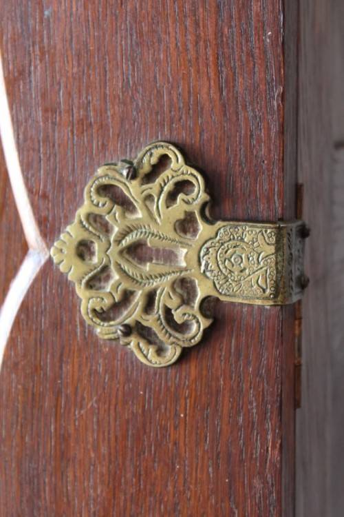 An impressive antique solid honeyed oak gabled double-door wardrobe w drawers & brass embellishments