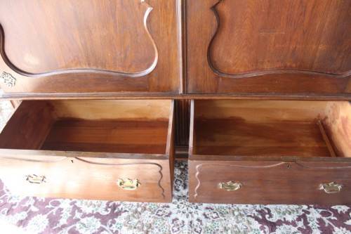 An impressive antique solid honeyed oak gabled double-door wardrobe w drawers & brass embellishments