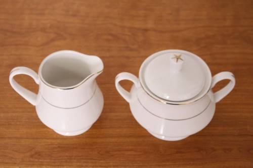 **RS17** Stunning white 8-setting porcelain tea service with a milk jug, sugar bowl and pastry plate