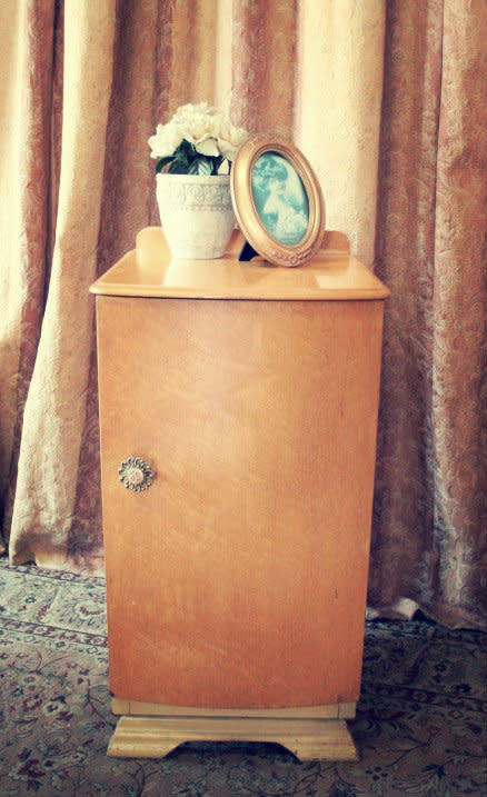 A single-door pedestal cabinet with a gorgeous metal flowered handle and a shelf-Lifespace Sale