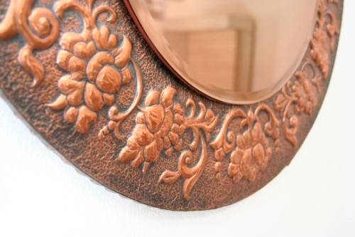 A superb antique ornately moulded copper framed round pink bevelled glass wall mirror - wow!!