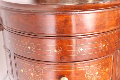 A spectacular and beautifully made solid rosewood round 12-drawer jewellery chest with brass inlay