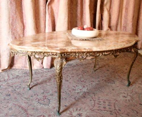 A superb solid brass and marble top oval coffee table. - stunning in formal lounges, entrances!!