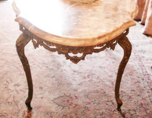 A superb solid brass and marble top oval coffee table. - stunning in formal lounges, entrances!!
